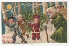 A JOYOUS CHRISTMAS POSTCARD - SANTA WITH CHILDREN  AND TOYS CIRCA 1909 picture