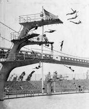Junior divers take the plunge in formation from all levels of the  .. Old Photo picture