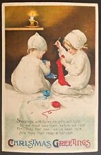 Ellen Clapsaddle Christmas Postcard~2 Little Girls Sew & Mend Christmas Stocking picture