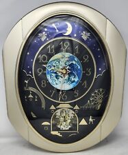 Small World Rhythm Peaceful Cosmos Melodies Wall Clock Magic Motion Music picture