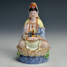 Sitting Lotus Avalokitesvara Bodhisattva carries ceramic Buddha statue with him picture