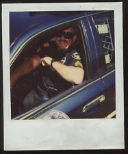 FOUND PHOTO Polaroid Police Officer in Squad Car Cop Color Snapshot VTG picture