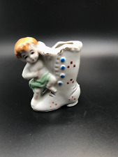 VINTAGE SMALL LITTLE BOY ON SHOE FIGURINE picture