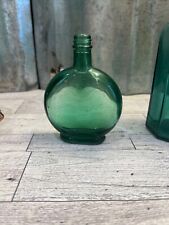 Vintage green glass bottle picture