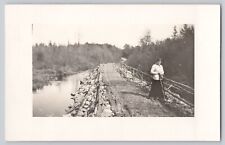 RPPC Woman Walking Across A Rural Bridge While Using Walking Stick AZO 1904-1918 picture