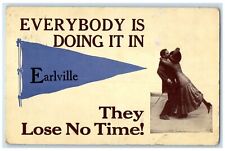 1912 Everything Is Doing It In Earlville Illinois IL Pennant Couple Postcard picture