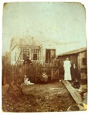 Antique Weird Group Photo Family in Their Yard Man Woman Child Dog 22x29 cm picture