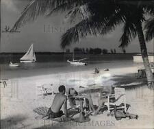 1965 Press Photo Beachgoers on Coast of Nassau, Bahamas - hps07546 picture