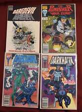 Four Marvel Comic Books, Daredevil and the Punisher, Two Darkhawk Comics and a P picture