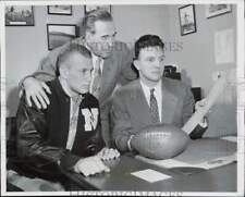 1955 Press Photo Northwestern University Footballers Check Spring Training List picture