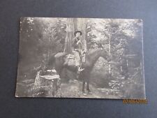 EARLY 1900's BLACK & WHITE POSTCARD LOGGER IN THE WOODS RIDING HIS HORSE picture