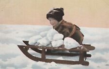 Outstanding boy/ sled snowball fight postcard c1915 picture