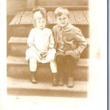 ID'd c1910s Cute Children on Porch RPPC Boy Girl Real Photo Postcard Nieman A123 picture