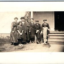 c1910s Outdoor Family House RPPC Porch Newsboy Cap Women Smoking Men Photo A192 picture