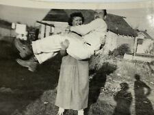 AgF) Found Photo Photograph Woman Picking Up Man Carrying Shadow People Odd picture