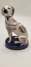 Staffordshire Lustred Dog Sitting on Blue Plinthe picture