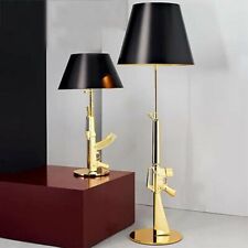 Gold Gun Floor Lamp with Black Shade picture