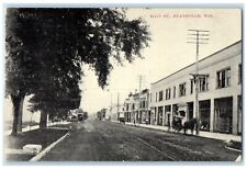 c1910 Main Street Horse Carriage Building Road Evansville Wisconsin WI Postcard picture