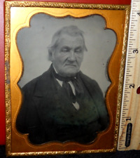 Quarter plate size tinted Ambrotype of older man in brass mat/frame picture