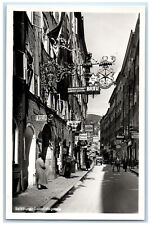 c1950's Getreidegasse Shopping Street in Salzburg Austria RPPC Photo Postcard picture