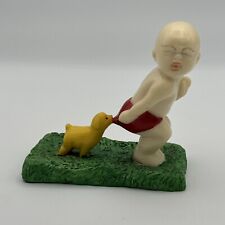 Vintage Dog Pulling Little Boy Figurine  picture