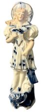 Blue and White Victorian Bisque Porcelain Young Lady with Paddle Figurine picture