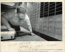 1991 Press Photo Man working on safety deposit boxes - lrb25827 picture