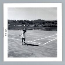 Vintage 1960s Child Playing Tennis on Court 3.5