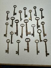 Twenty-Two Old Brass Skeleton Keys picture