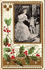 1907 A Merry Christmas Woman Child & Holly Vintage Postcard picture
