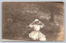 RPPC Lady Grabs Sides of Cloche Hat AZO 1904-1918 ANTIQUE Postcard 1414 picture