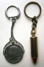 2 Vintage Keychains, a Kennedy Heads/tail Spinner, and a bullet keychain. picture