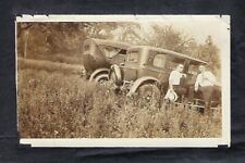 c1920s-30s, Photo of 2 Antique Cars in a Field with 2 Men Standing By Cars picture