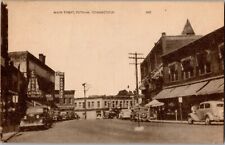 c 1940 Putnam, Connecticut Main Street Postcard Hardware Store Putnam Clothing picture