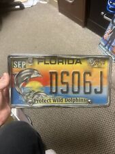 Vintage 2003 Florida Protect Wild Dolphins License Plate DS06J picture