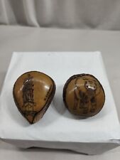 Hand Carved and Signed Pair of Hard Shell Nuts Elephant & Ship picture