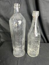 224. 2 Antique Embossed Bottles  picture