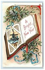 Postcard A Bright New Year horseshoe windmill book blue ribbons embossed F18 picture