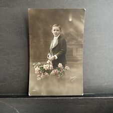French colorized RPPC Photo Postcard Young Boy with Flowers UNP picture