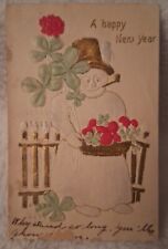1908 A HAPPY  New Year  Postcard Snowman, Pipe, Clovers & Berries Embossed picture