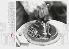 1974 Press Photo Piece of gold to be melted at Engelhard Minerals Corp. NJ plant picture