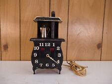 Vintage SPARTUS Pot Belly Stove Electric Clock ~ Runs & Keeps Time picture