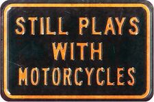 STILL PLAYS WITH MOTORCYCLES HEAVY DUTY USA MADE METAL ADVERTISING SIGN picture