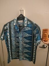 don draper Hawaii shirt and tiki cup picture