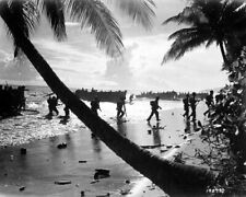 U.S. Marines rush ashore from landing boat on Guadalcanal 8x10 WWII Photo 819a picture