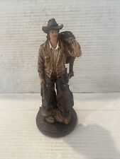 Resin Cowboy Statue : Carrying A Saddle & Rope Bx34 picture