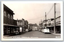 Coquille Oregon~Stevens Hardware~Drugs~Bakery~Pastime Tavern~1930s Cars~RPPC picture