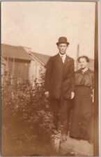 Vintage 1910s RPPC Real Photo Postcard Man & Woman in Home Garden / Bowler Hat picture