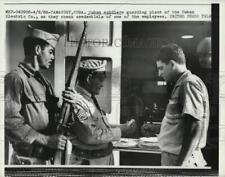 1958 Press Photo Soldiers guard a Cuban Electric Company plant near Camaguey picture