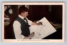 Drawing the cartoon for the Philadelphia Record, Pennsylvania Vintage Postcard picture